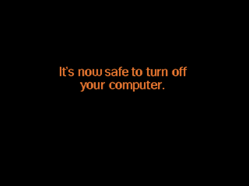 orange text on a black background: It's now safe to turn off your computer.